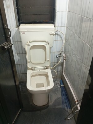 Bathroom in 1 BHK Apartment at Sai Prasad CHS, Andheri East – for Rent