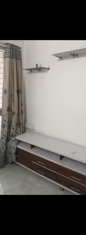 Living Room in 1 BHK Apartment at Lodha Amara, Kolshet Road – for Rent