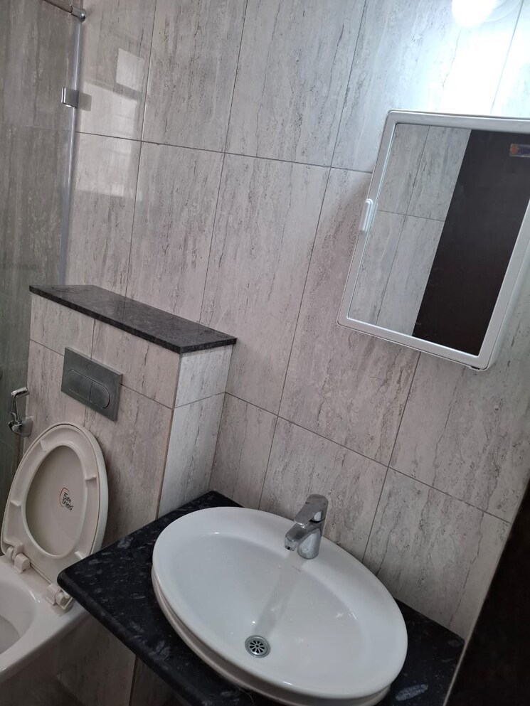 Bathroom, kolte-patil-life-republic 3 Bedroom 1000 Sq.Ft. Apartment In Hinjewadi Pune 9347681