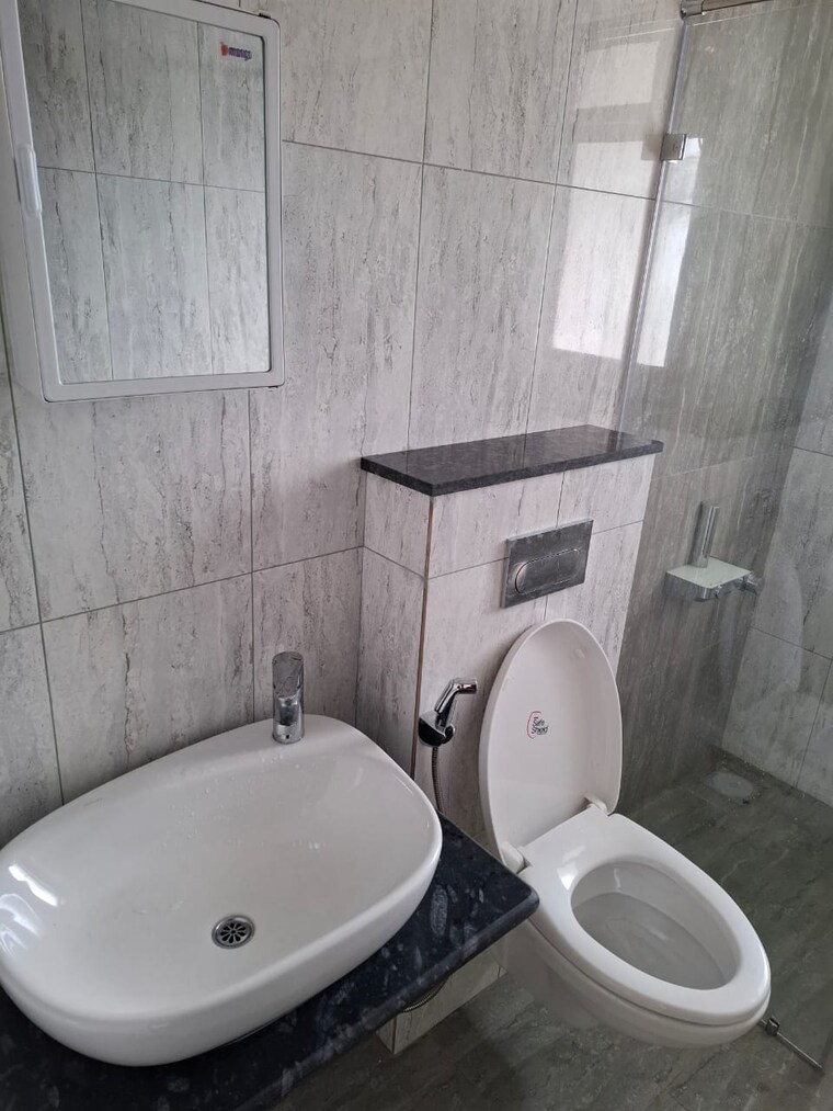 Bathroom, kolte-patil-life-republic 3 Bedroom 1000 Sq.Ft. Apartment In Hinjewadi Pune 9347681