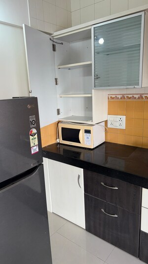 Kitchen in 2 BHK Apartment at Kapil Malhar Apartment, Baner – for Rent