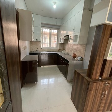 Kitchen in 3 BHK Apartment at BPTP Parkland Pride, Sector 77 – for Rent