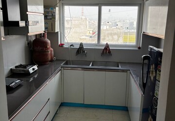 Kitchen in 2 BHK Apartment at Aura Homes, High Ground – for Rent