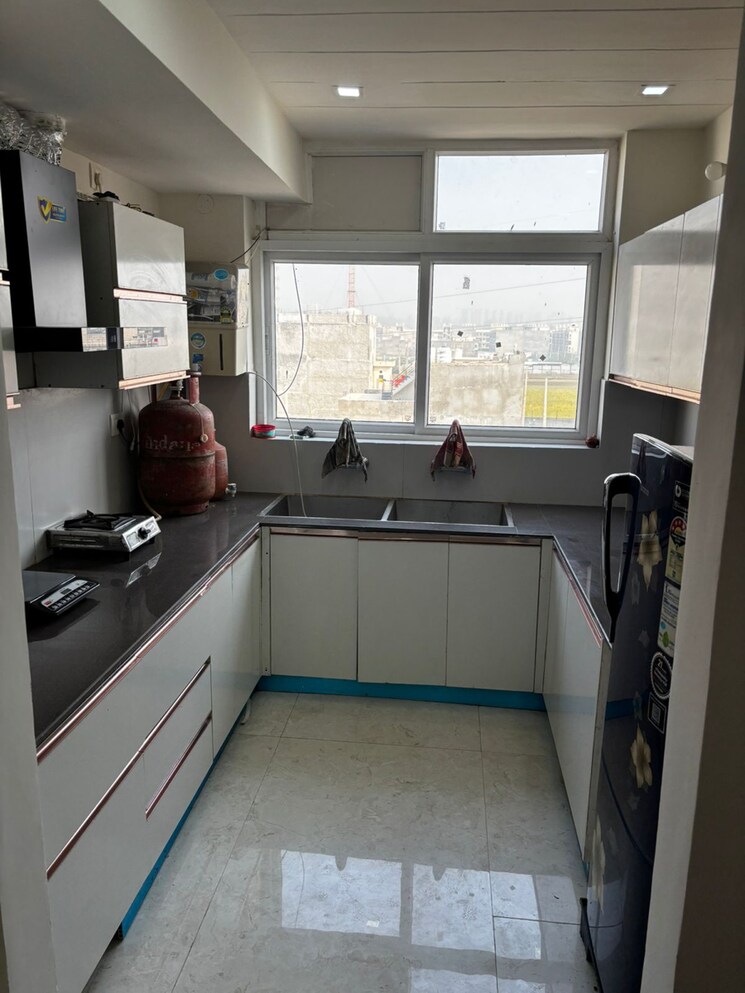 Kitchen, aura-homes 2 Bedroom 1200 Sq.Ft. Apartment In High Ground Zirakpur 9347757