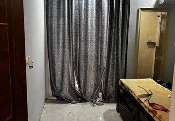 Bedroom in 2 BHK Apartment at Aura Homes, High Ground – for Rent