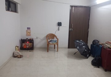 Living Room in 1 BHK Apartment at Lodha Palava Downtown, Dombivli East – for Rent