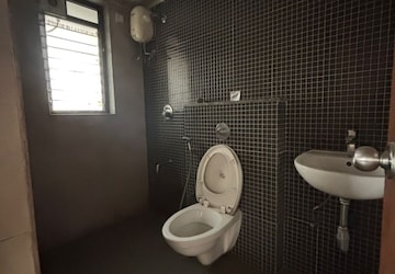 Bathroom in 2 BHK Apartment at Lodha Lakeshore Greens, Dombivli East – for Rent