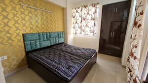 Bedroom in 2.5 BHK Apartment at Amrapali Princely Estate, Sector 76 – for Rent