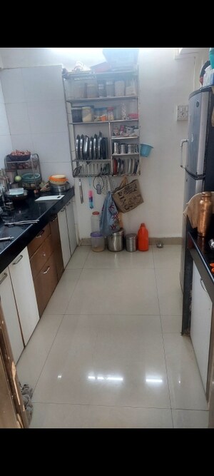 Kitchen in 2 BHK Apartment at Ostwal Avenue, Mira Road – for Sale