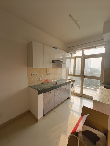 Kitchen in 2 BHK Apartment at Adani Aangan, Sector 89a – for Rent