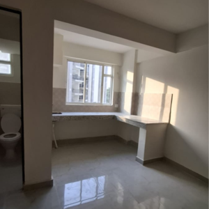 Kitchen in 1 RK Apartment at Wave Floors Premium, Wave City – for Rent