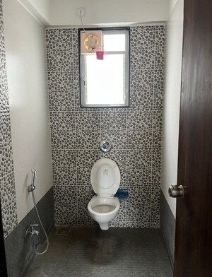 Bathroom in 3 BHK Apartment at Vardhaman Dreams Phase II, Wakad – for Rent