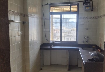 Kitchen in 1 BHK Apartment at Coral Reasidency, Pratha Pushp Society – for Rent