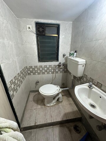 Bathroom in 1.5 BHK Apartment at Om CHS Sion, Sion – for Rent