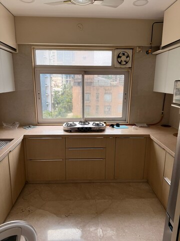 Kitchen in 2 BHK Apartment at Raunak Viraj Bliss, Khar West – for Sale