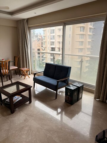 Living Room in 2 BHK Apartment at Raunak Viraj Bliss, Khar West – for Sale