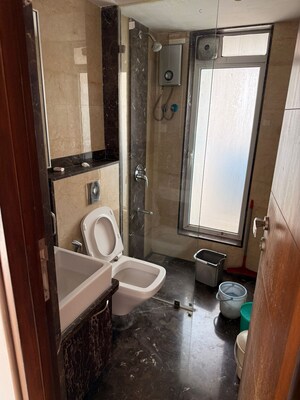 Bathroom in 2 BHK Apartment at Raunak Viraj Bliss, Khar West – for Sale