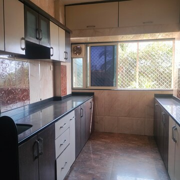 Kitchen in 1 BHK Apartment at Sea Shell Apartment, Andheri West – for Rent
