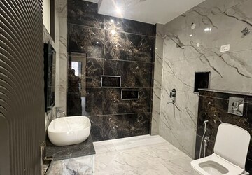 Bathroom in 4 BHK Builder Floor at Green Fields Colony – for Rent