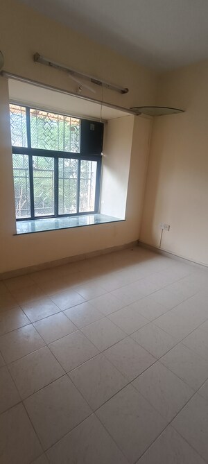 Room in 1 BHK Apartment at Green Hills, Kandivali East – for Rent