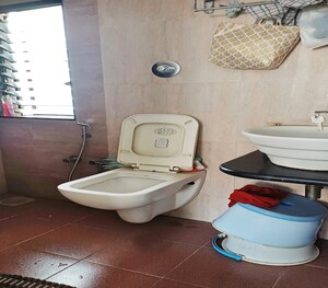 Bathroom in 2 BHK Apartment at Lalbaug – for Sale