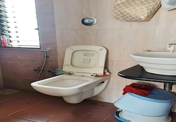 Bathroom in 2 BHK Apartment at Lalbaug – for Sale