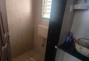 Bathroom in 1.5 BHK Apartment at GK Rose Icon, Pimple Saudagar – for Sale