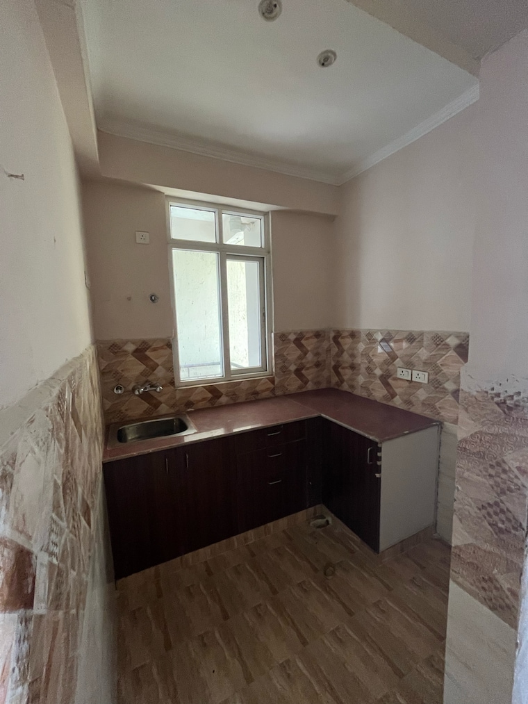 Kitchen, amrapali-golf-homes 2 Bedroom 835 Sq.Ft. Apartment In Haibatpur Greater Noida 9348315