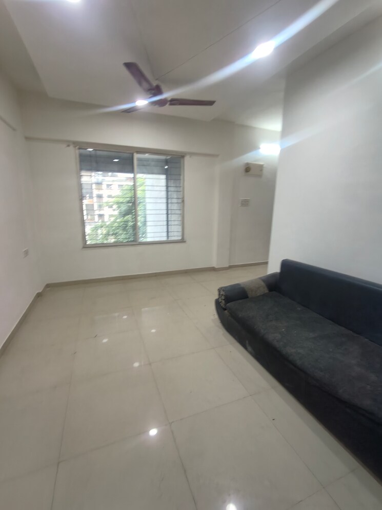 Living Room, sai-ambience-sai-vision 2 Bedroom 1000 Sq.Ft. Apartment In Pimple Saudagar Pune 9348308