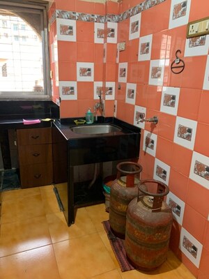 Team Area in 1 BHK Apartment at Greenfield Rocks CHS, Jogeshwari East – for Rent