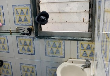 Bathroom in 1 BHK Apartment at Greenfield Rocks CHS, Jogeshwari East – for Rent