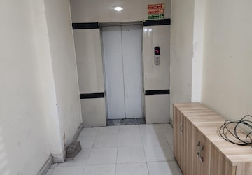 Building Lobby in 3.5 BHK Apartment at Charms Castle, Raj Nagar Extension – for Sale