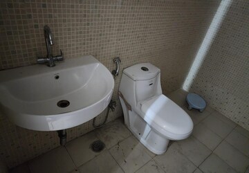 Bathroom in 3.5 BHK Apartment at Charms Castle, Raj Nagar Extension – for Sale