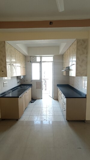 Kitchen in 3 BHK Apartment at Amrapali Princely Estate, Sector 76 – for Rent