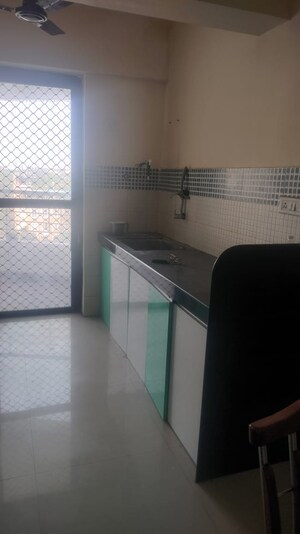 Kitchen in 3 BHK Apartment at Rutuparna Apartments, Baner – for Rent