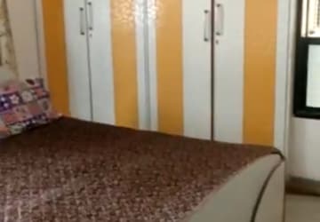 Bedroom in 3 BHK Apartment at Green Acres Apartment, Waghbil – for Rent