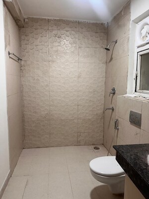 Bathroom in 4 BHK Apartment at Adani Oyster Grande Phase 2, Sector 102 – for Rent