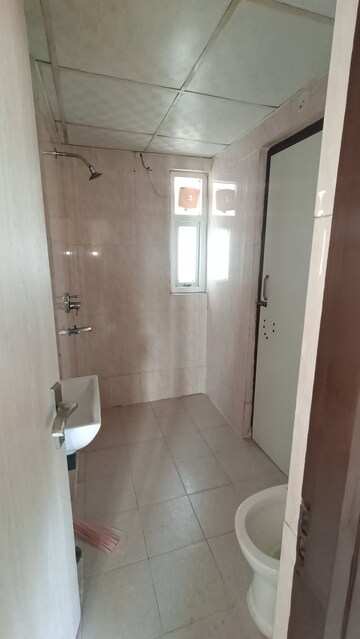 Bathroom in 3 BHK Apartment at Amrapali Princely Estate, Sector 76 – for Rent
