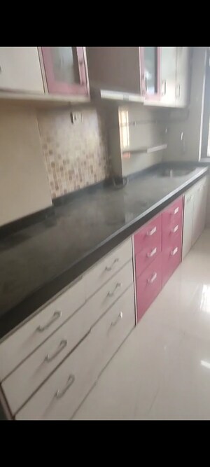Kitchen in 3 BHK Apartment at Green Acres Apartment, Waghbil – for Rent