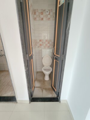 Building Lobby in 1 BHK Apartment at Wadgaon Sheri – for Rent