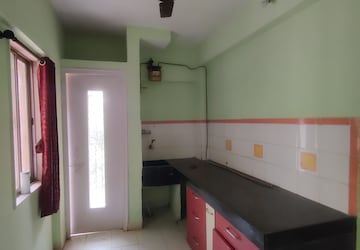Kitchen in 1 BHK Apartment at Raunak Heights, Ghodbunder Road – for Rent