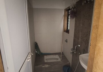 Bathroom in 1 BHK Apartment at Puranik Hometown, Ghodbunder Road – for Rent
