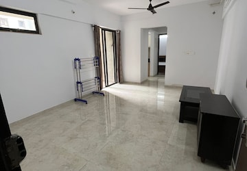 Living Room in 1 BHK Apartment at Lodha Regalia, Dombivli East – for Rent