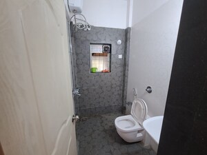 Bathroom in 2 BHK Apartment at Rutu Estate, Brahmand – for Rent