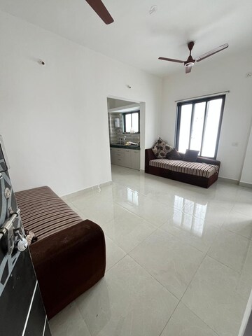 Living Room in 2 BHK Apartment at Alankapuri CHS, Kothrud – for Rent