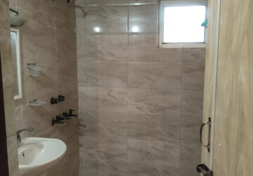 Bathroom in 2 BHK Apartment at Arun Vihar Sector 37, Sector 37 – for Rent