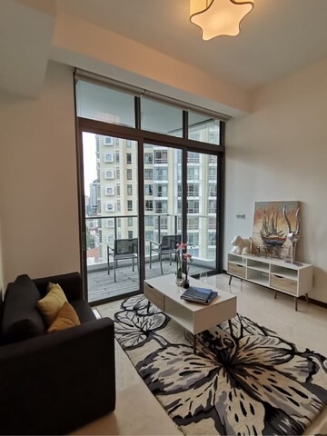 Living Room in 2 BHK Apartment at Silver Sand CHS, Andheri West – for Rent
