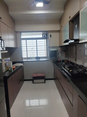Kitchen in 2 BHK Apartment at Dosti Group Imperia, Manpada – for Rent