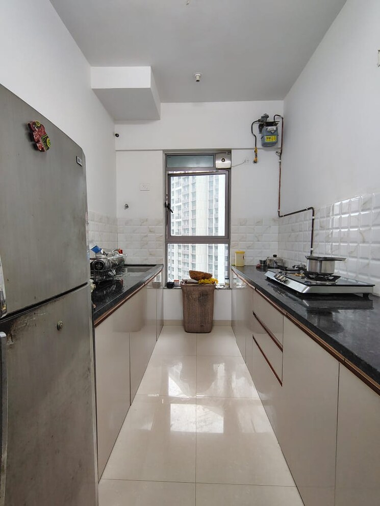 Kitchen, kalpataru-immensa 2 Bedroom 598 Sq.Ft. Apartment In Kolshet Road Thane 9348802