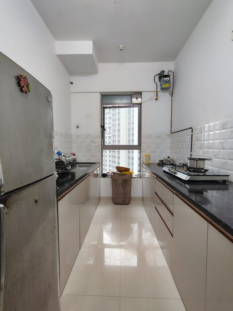 Kitchen, kalpataru-immensa 2 Bedroom 598 Sq.Ft. Apartment In Kolshet Road Thane 9348802